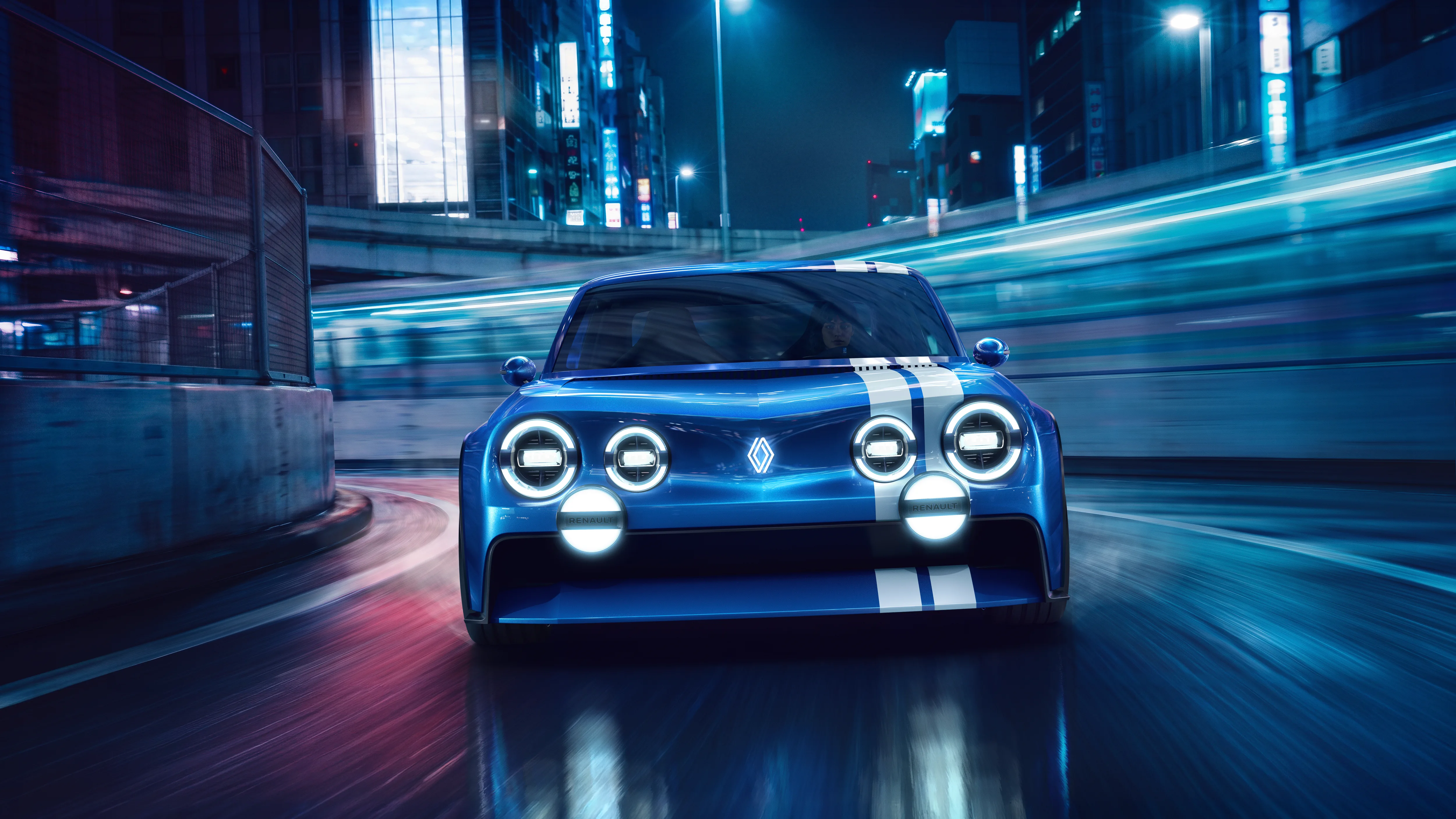 Renault 8 Gordini Concept ön görünüm, altı yuvarlak far ve çift beyaz şeritli mavi gövde
