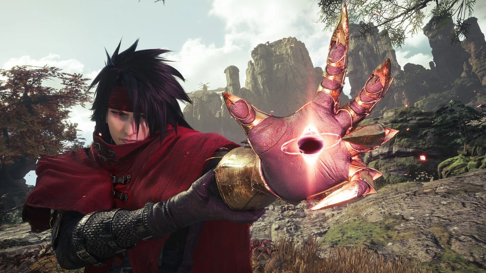 Final Fantasy VII Revelation'da Vincent Valentine, metal pençesinde kırmızı bir küre tutuyor