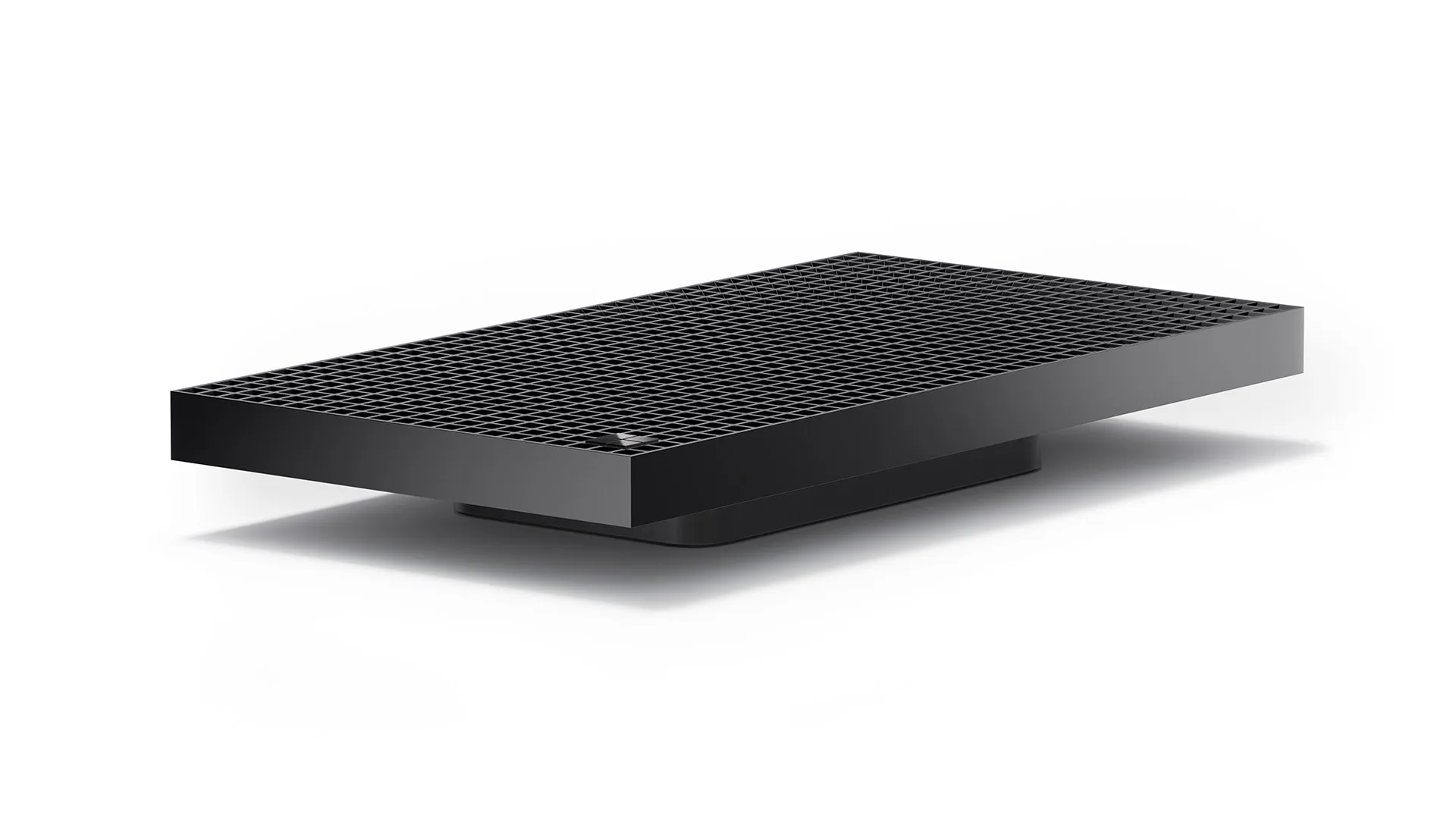 Üstü delikli ızgaralı, yassı ve siyah kompakt Surface RTX Spark Dev Box