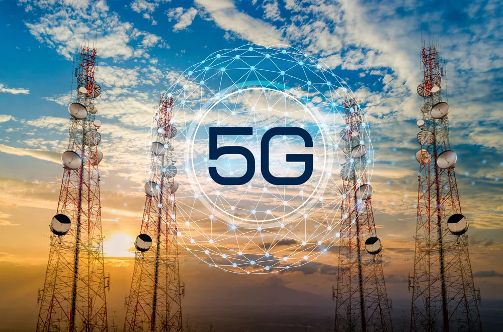A vibrant futuristic city skyline showcasing 5G technology with diverse people using smart devices.