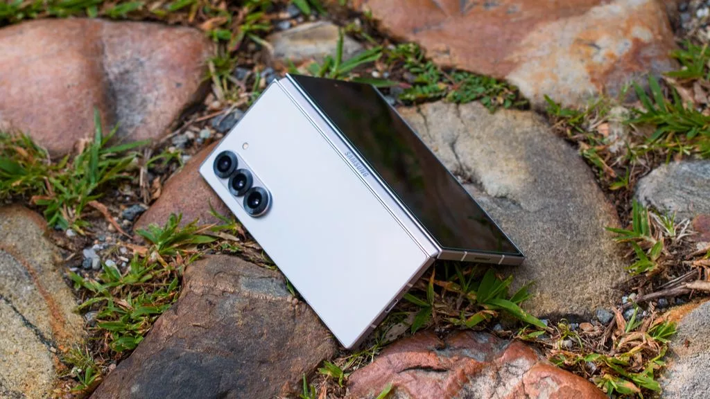 Aesthetic digital artwork of the Samsung Galaxy Z Fold7 showcasing its foldable design in a futuristic setting.