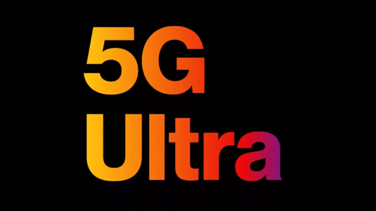 A dynamic visual showcasing the Verizon 5G technology at the Indianapolis 500 race, featuring racing cars, technology elements, and vibrant colors, perfect for social media and blog use.