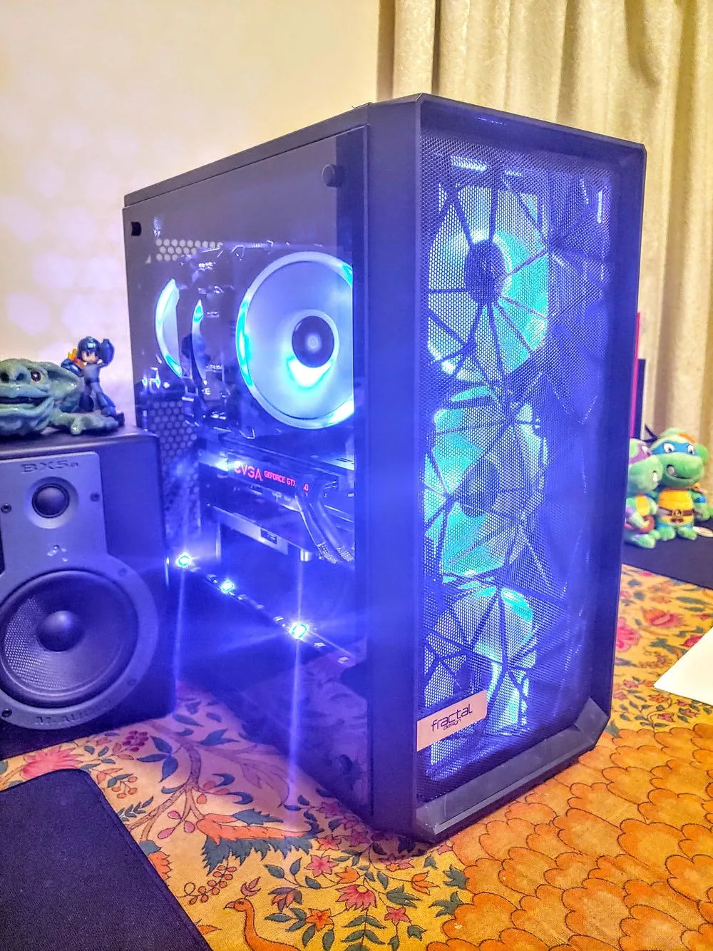A modern depiction of the Fractal Meshify 3 computer case showcasing its advanced cooling design in a sleek, futuristic setting.