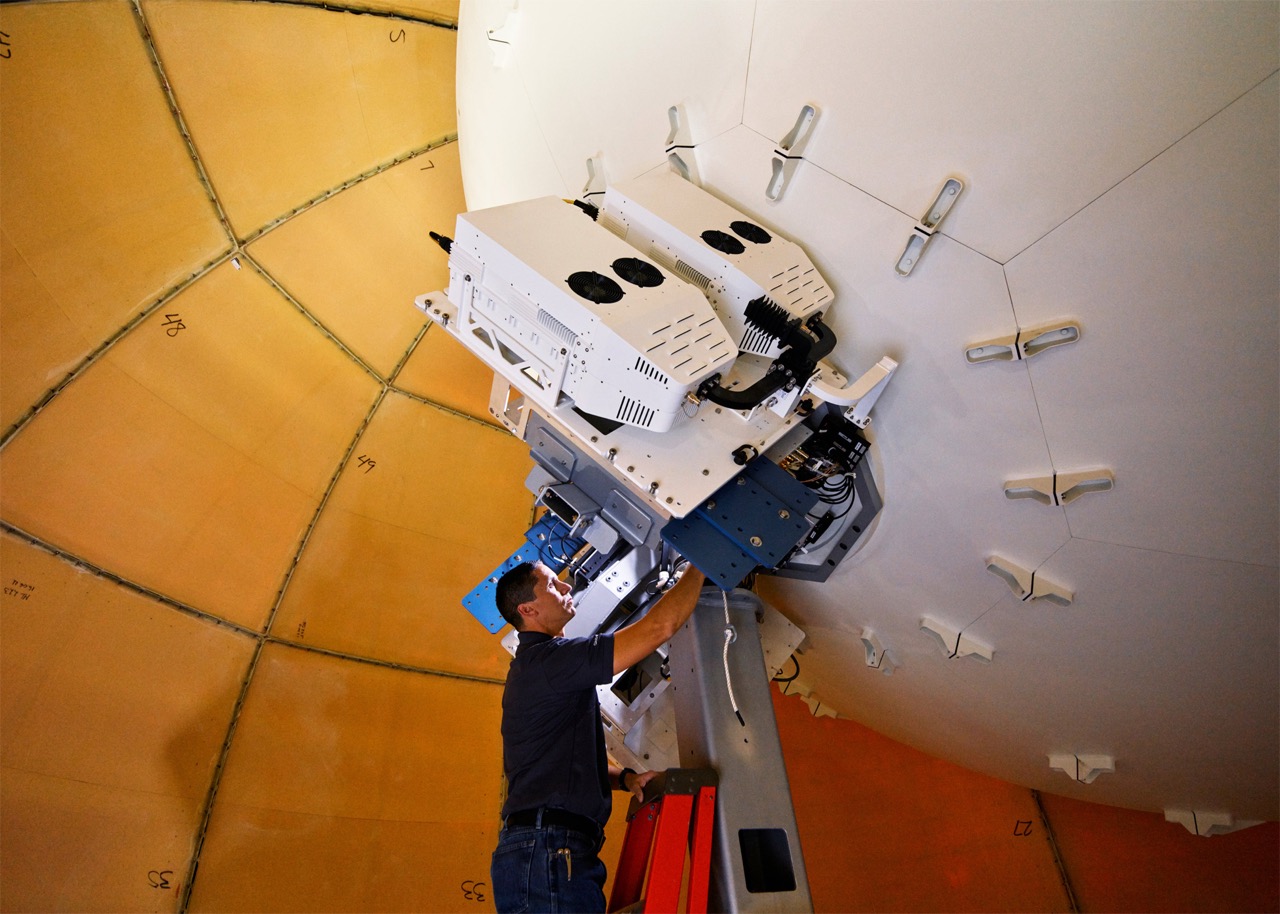 Futuristic scene of satellite launch with Apple and Globalstar's partnership, showcasing modern technology and innovation.