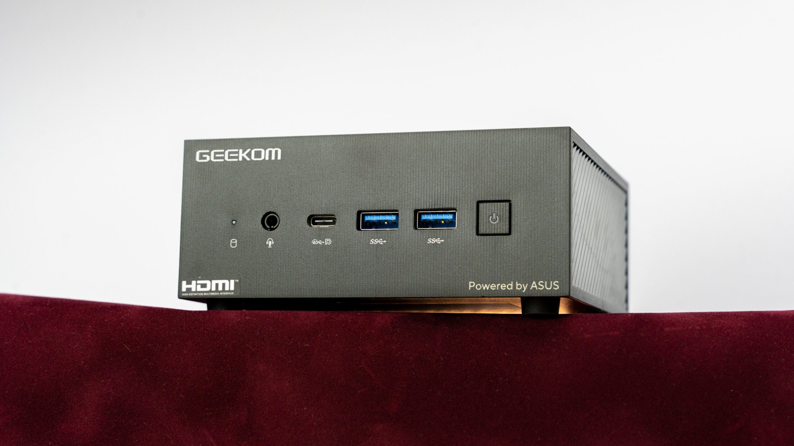 A modern and aesthetic depiction of Geekom A6 Mini PC in a sleek desktop environment.