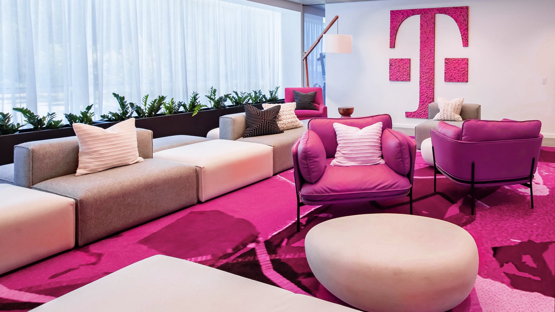 A modern digital artwork representing a T-Mobile meeting focused on innovation and big changes in telecommunications.