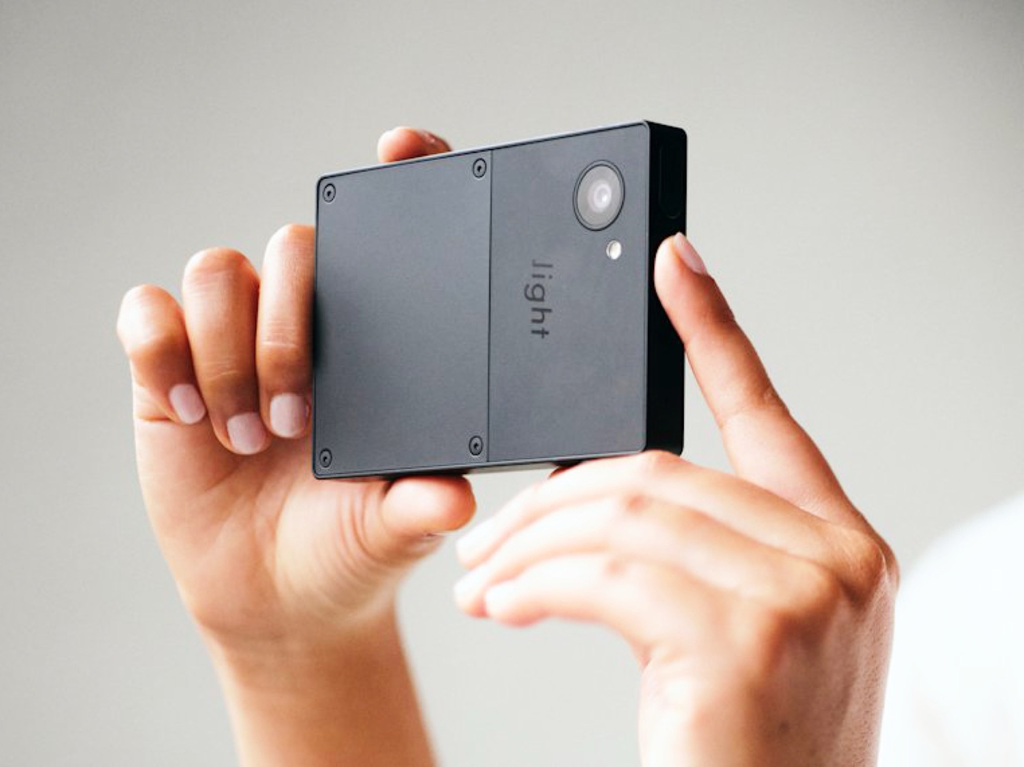 A minimalist depiction of the Light Phone 3 in a stylish environment highlighting its features and design.