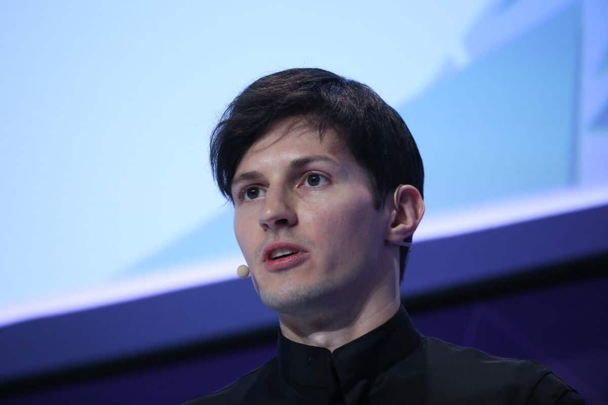 A modern digital artwork featuring Pavel Durov, the CEO of Telegram, with a French cityscape in the background, reflecting themes of technology and communication.