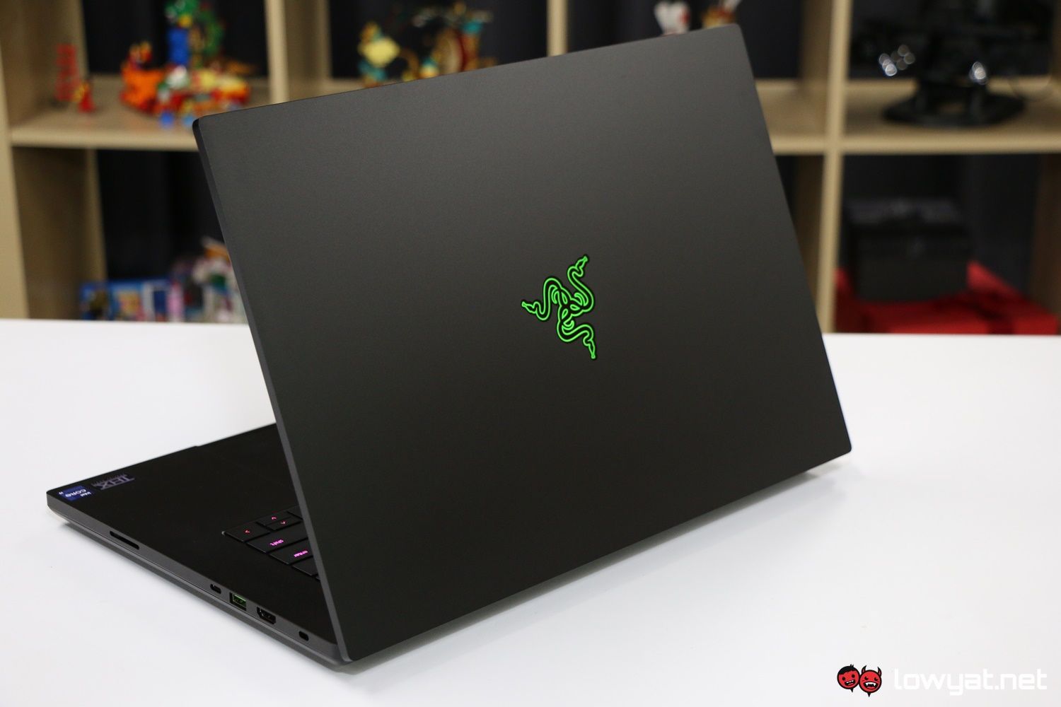 Futuristic design of Razer Blade 16 and Blade 18 laptops with glowing accents and modern aesthetics.