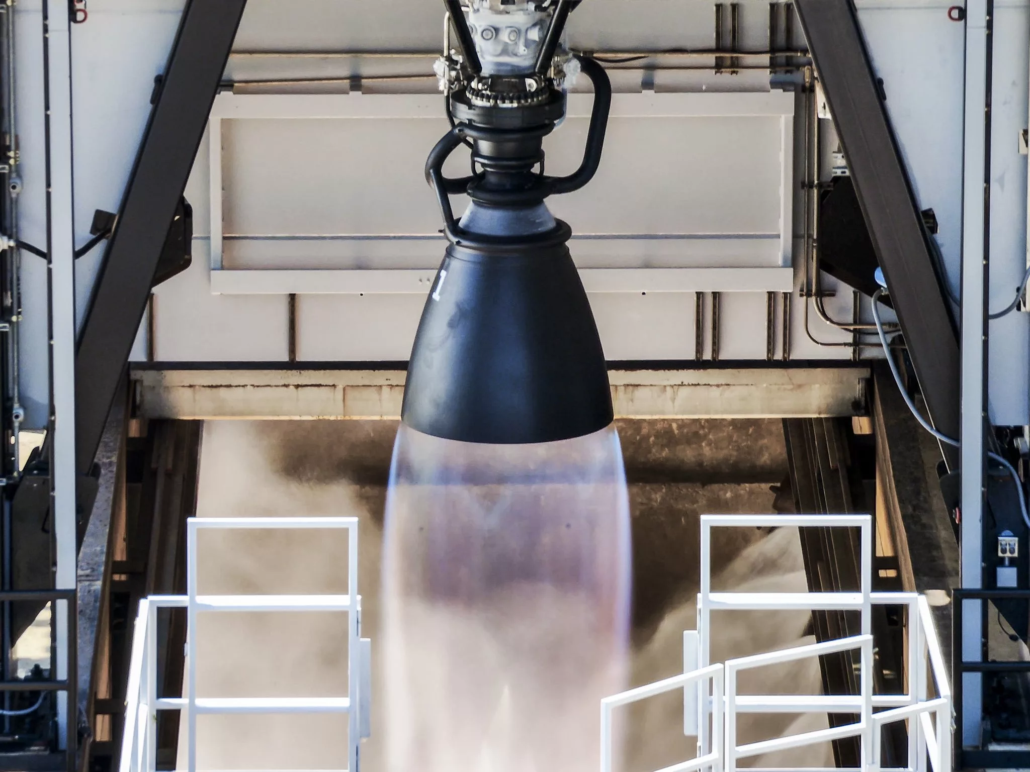 A modern and aesthetic illustration of the SpaceX Raptor 3 rocket engine against a cosmic backdrop.
