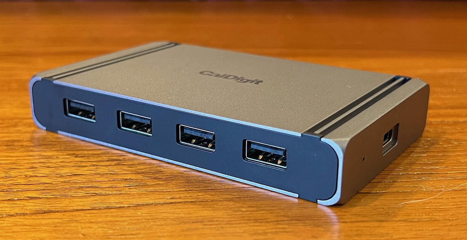 CalDigit Element 5 Hub displayed in a modern workspace, emphasizing its Thunderbolt 5 connectivity and sleek design.