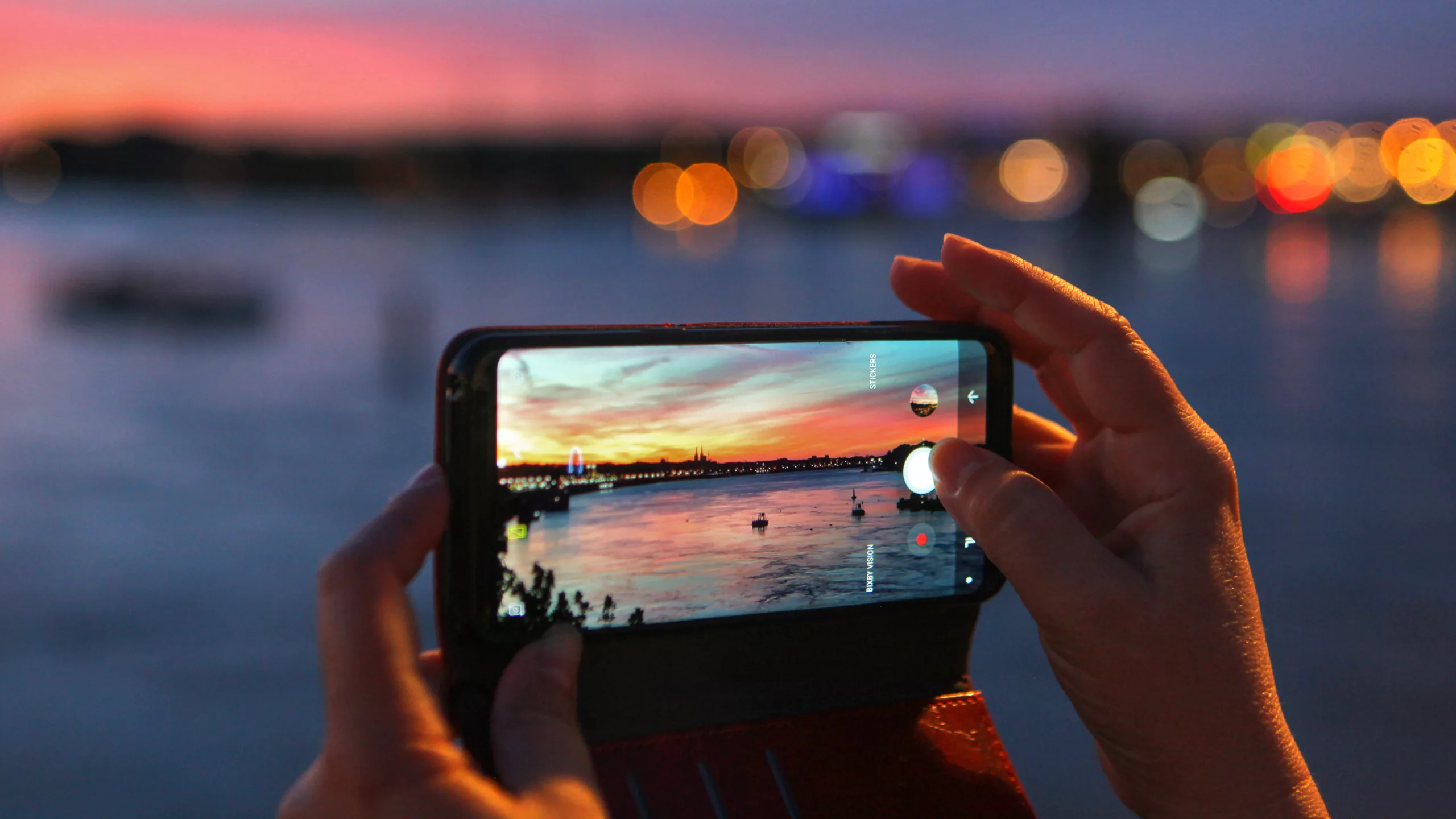 Modern aesthetic image of a smartphone camera highlighting creative photography and savings techniques.