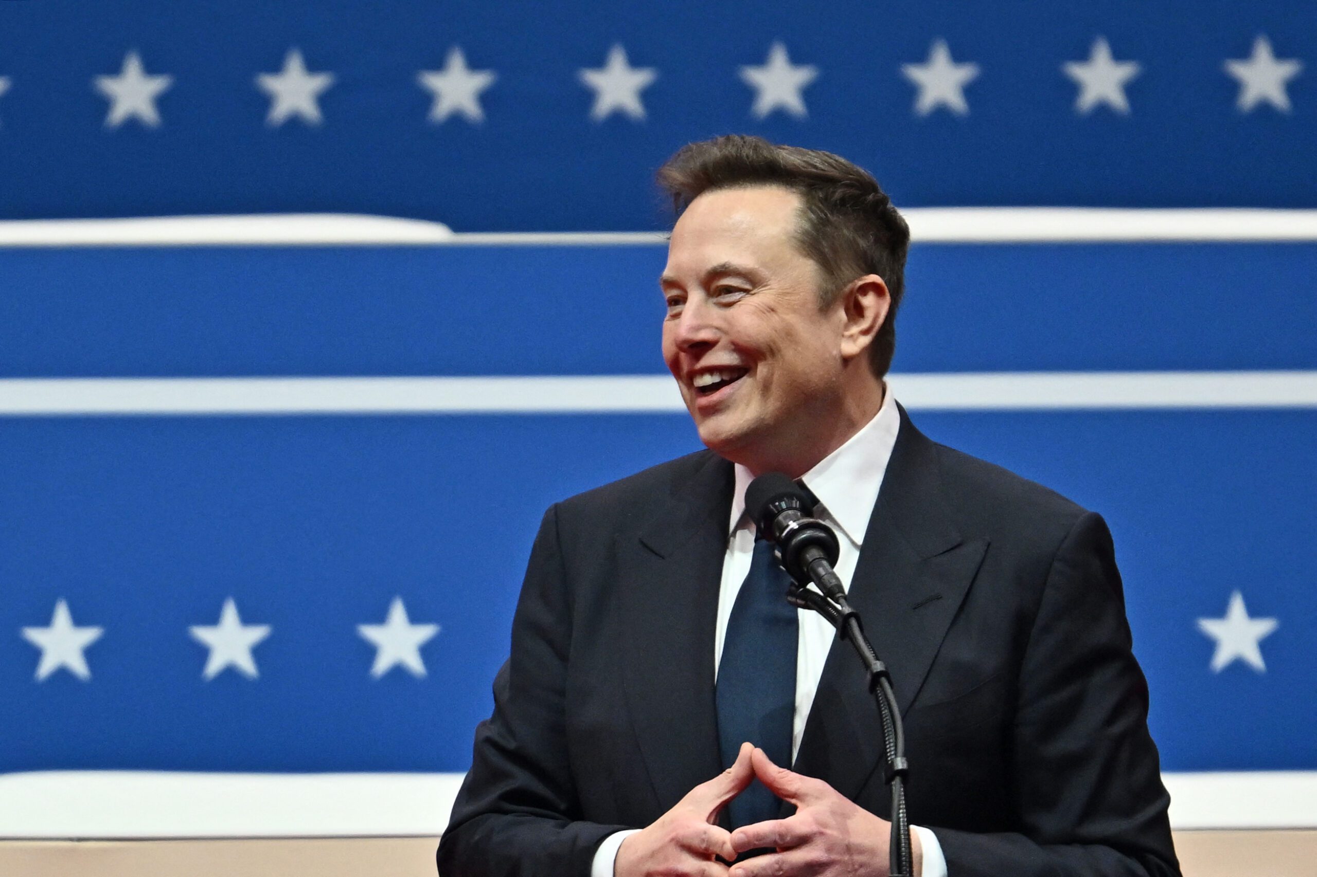 An illustration of Elon Musk and Donald Trump symbolizing their complex relationship against a futuristic backdrop, depicting innovation and political tension.
