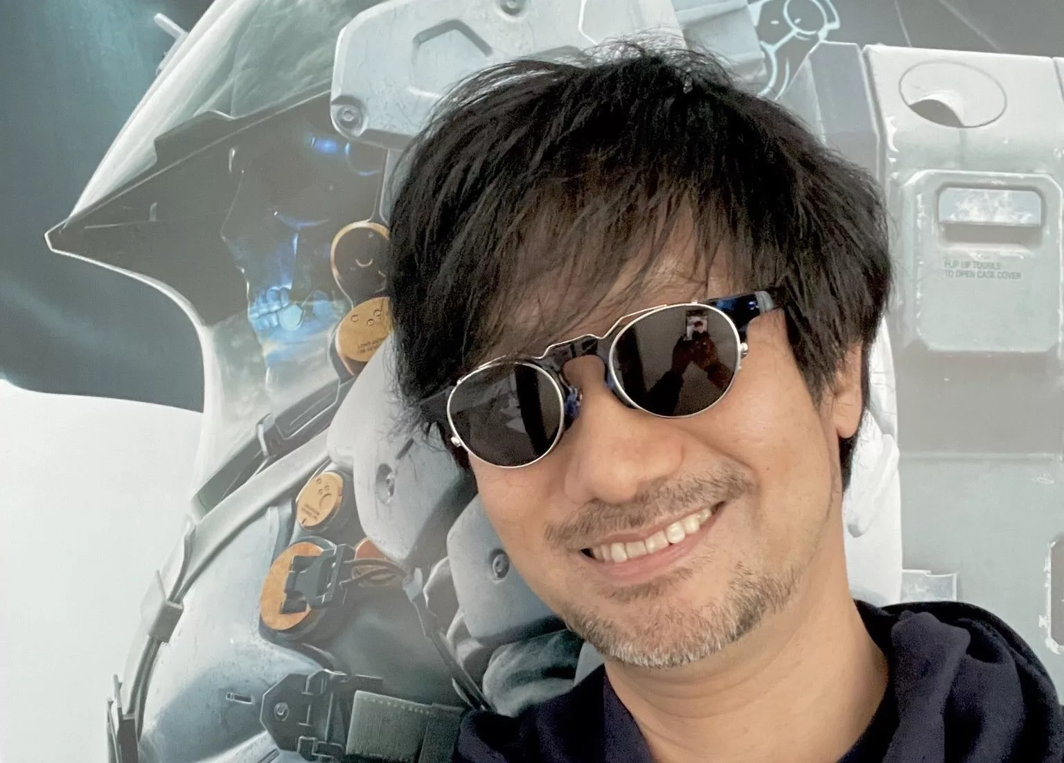 Futuristic game design concept inspired by Hideo Kojima exploring themes of life after death with technology and surreal elements.