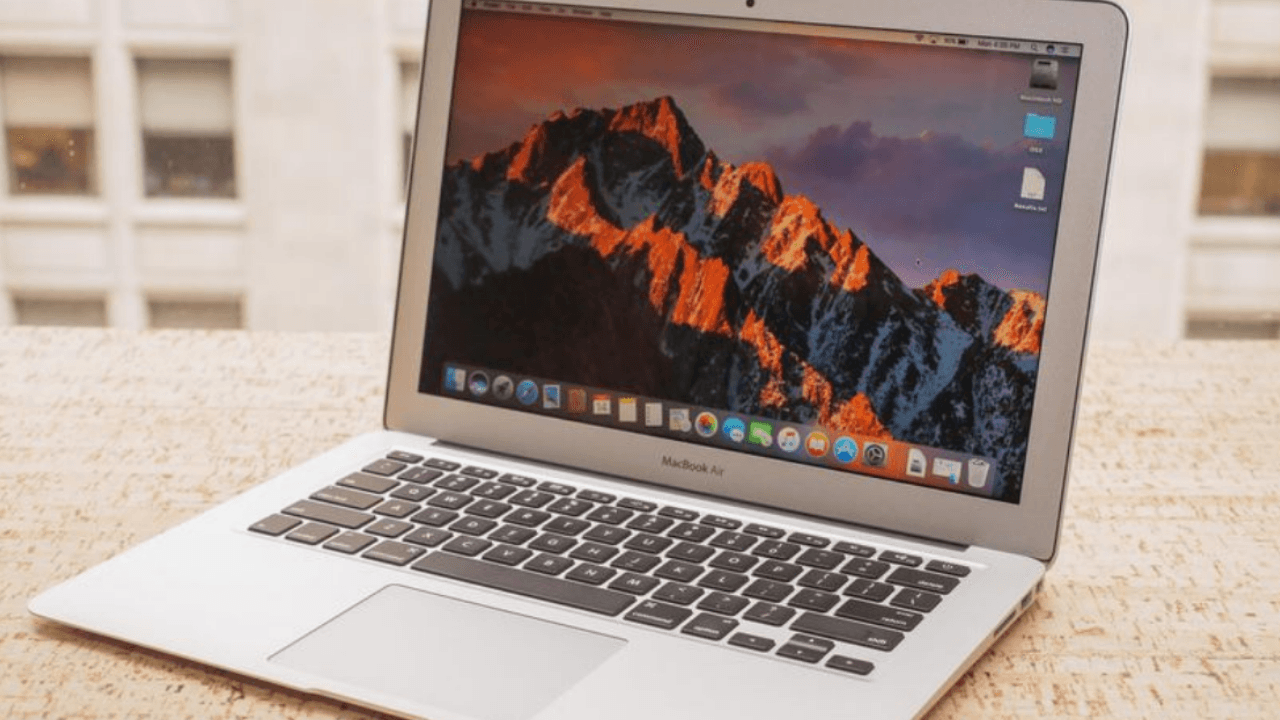 A modern aesthetic visual representation of MacBook Air M4 issues and Apple’s technical problems.