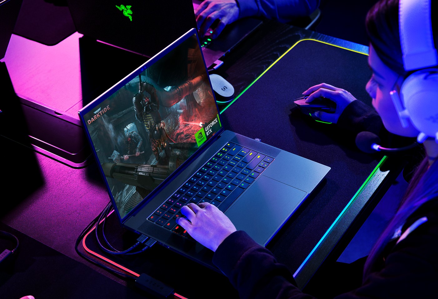 High-quality digital illustration of Razer Blade 16 and 18 laptops in a stylized tech environment.