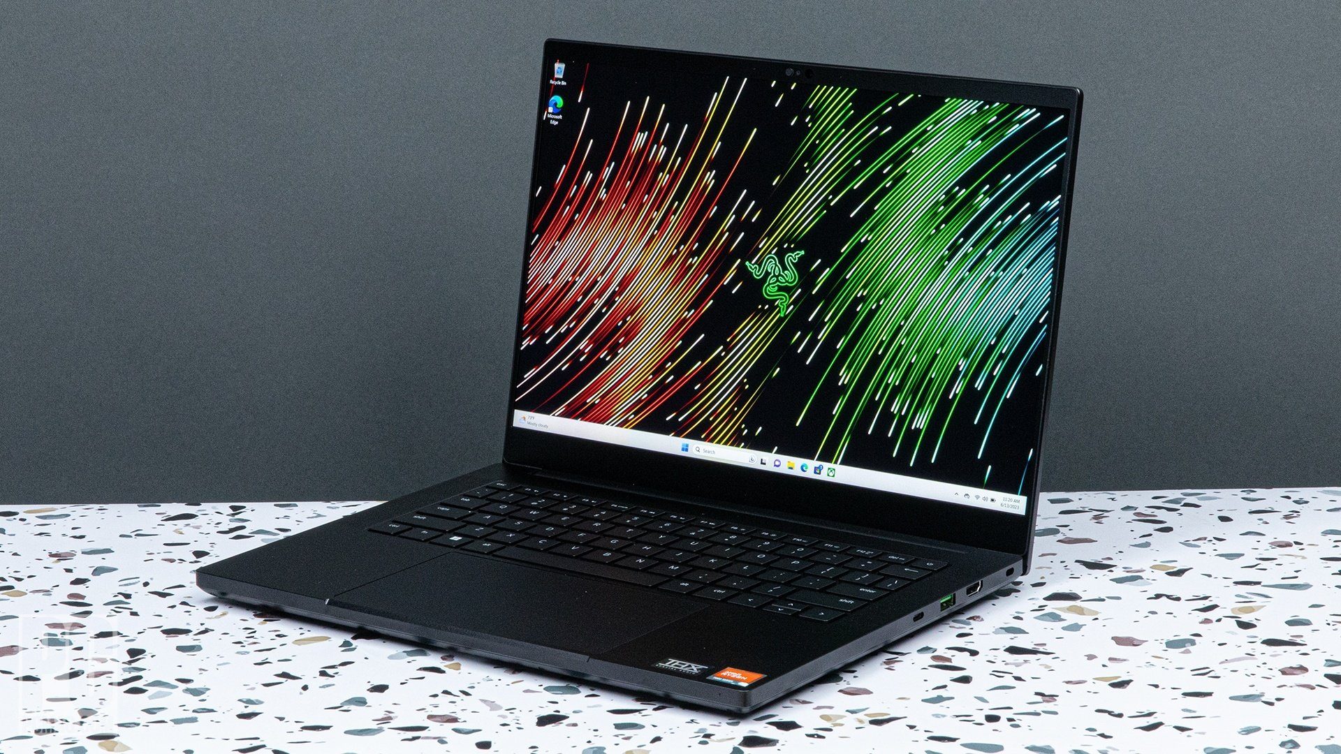 Stylish design showcasing Razer Blade 16 and 18 gaming laptops with a modern aesthetic.