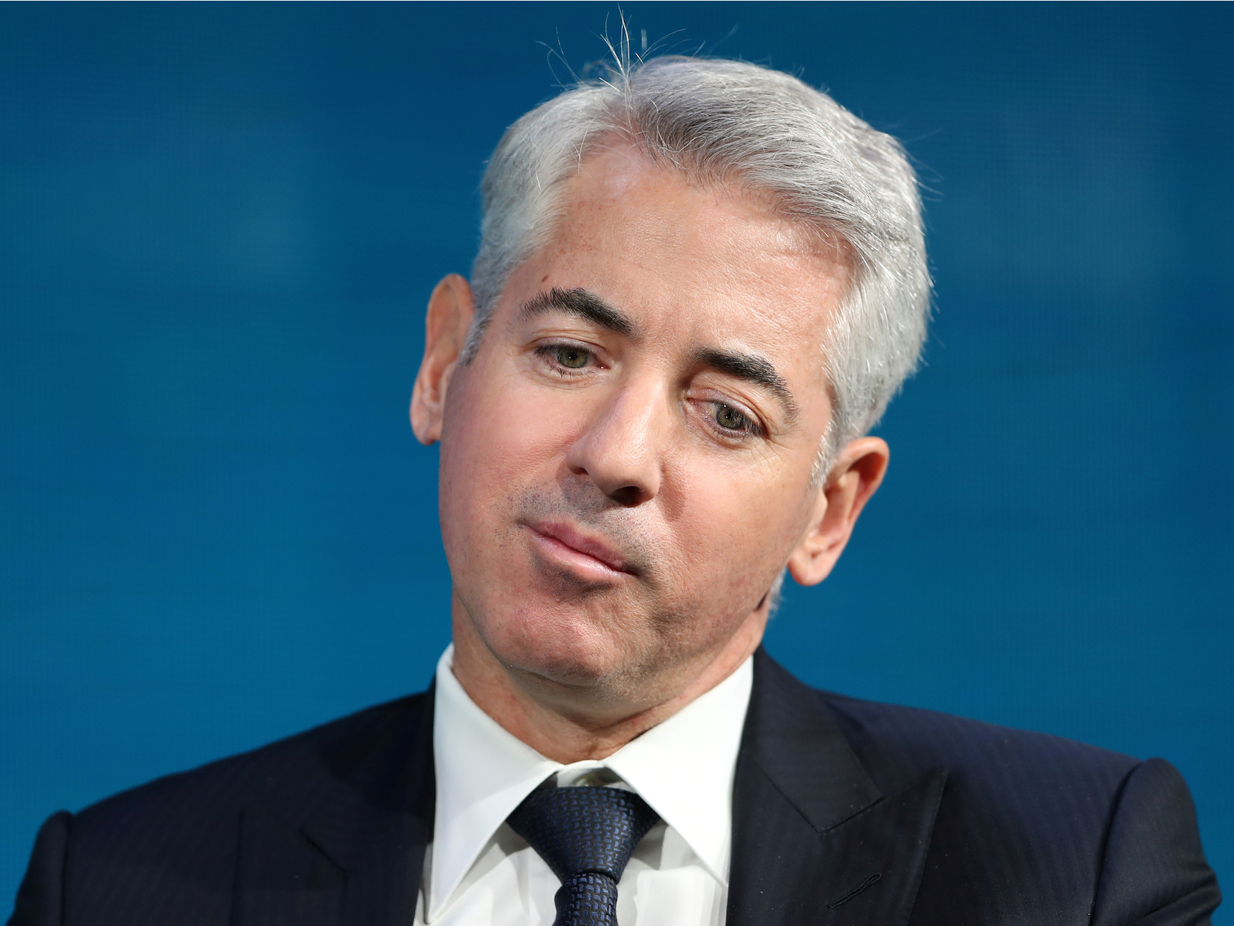 A modern artistic representation of Bill Ackman highlighting his support for Trump and themes of economic recession with financial graphs and political symbols.