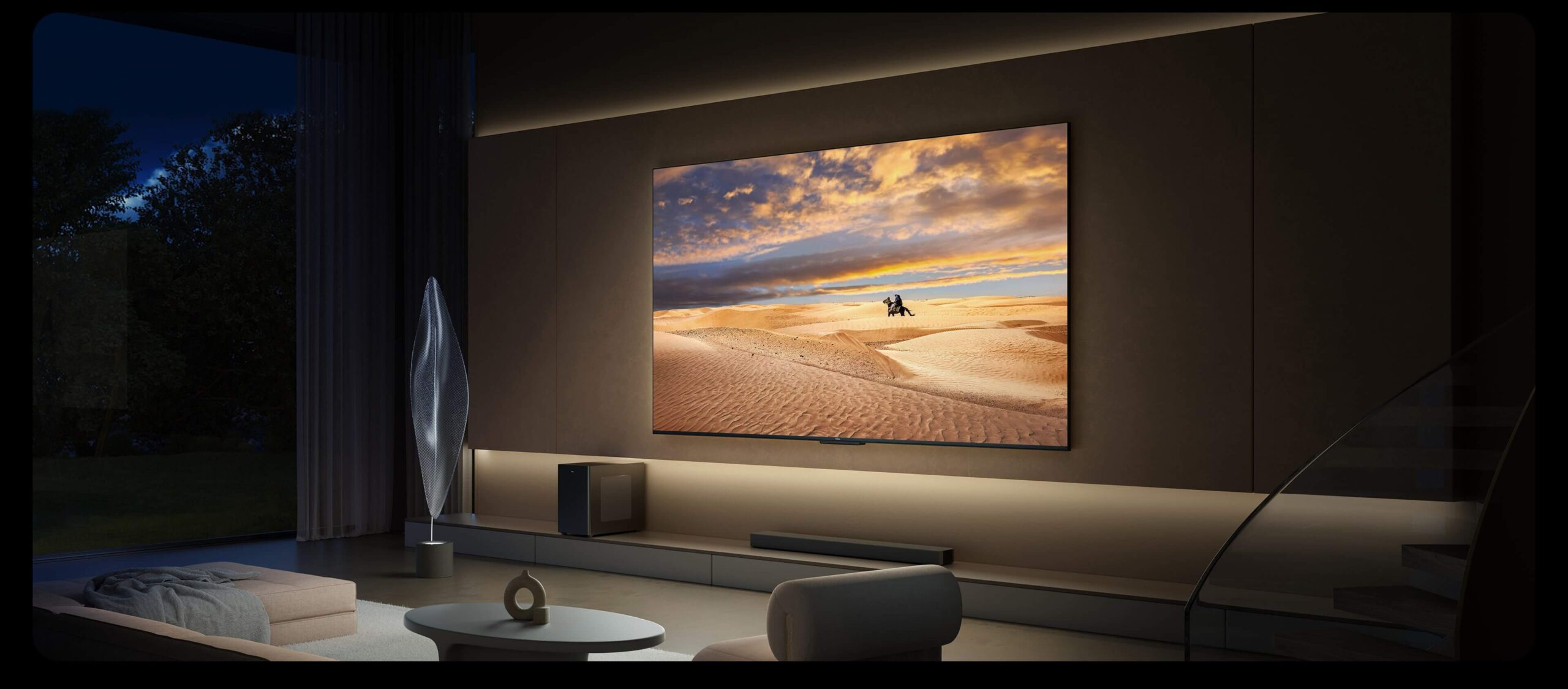 A modern living room showcasing the TCL Q6C QD-Mini LED TV with gaming and movie enjoyment elements.